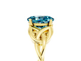 Yellow gold Oval Cut Blue Topaz Solitaire Engagement Ring with Celtic Knot Band and Four-Prong Setting_5