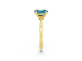 Yellow gold Oval Cut Blue Topaz Solitaire Engagement Ring with Classic Band and Four-Prong Setting_26