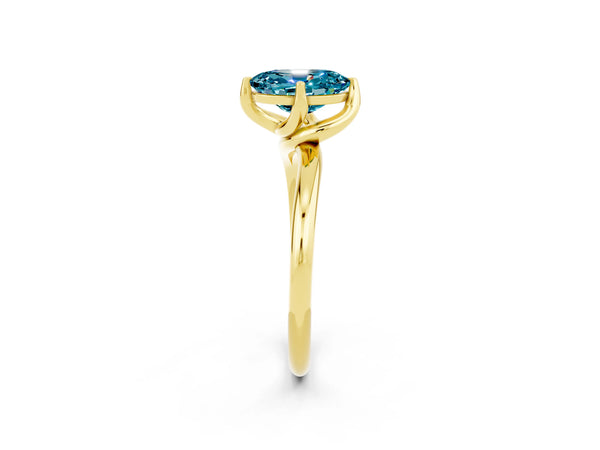 Yellow gold Oval Cut Blue Topaz Solitaire Engagement Ring with Four-Prong Setting and Classic Band