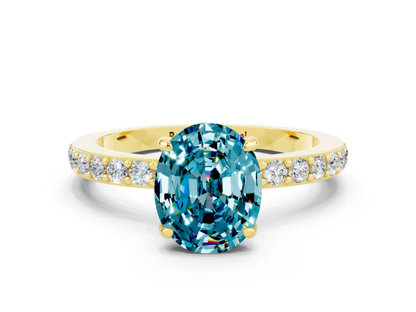 Yellow gold Oval Cut Blue Topaz Solitaire Engagement Ring with Pavé Band and Four-Prong Setting