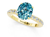 Yellow gold Oval Cut Blue Topaz Solitaire Engagement Ring with Pavé Band and Four-Prong Setting_13