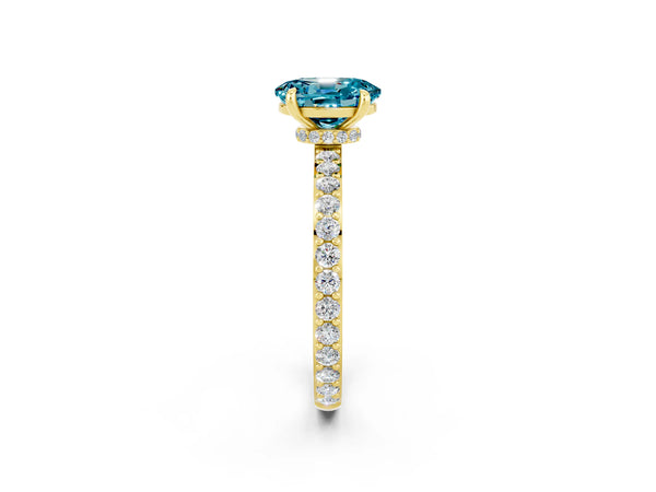 Yellow gold Oval Cut Blue Topaz Solitaire Engagement Ring with Pavé Band and Four-Prong Setting