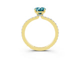 Yellow gold Oval Cut Blue Topaz Solitaire Engagement Ring with Pavé Band and Four-Prong Setting_15