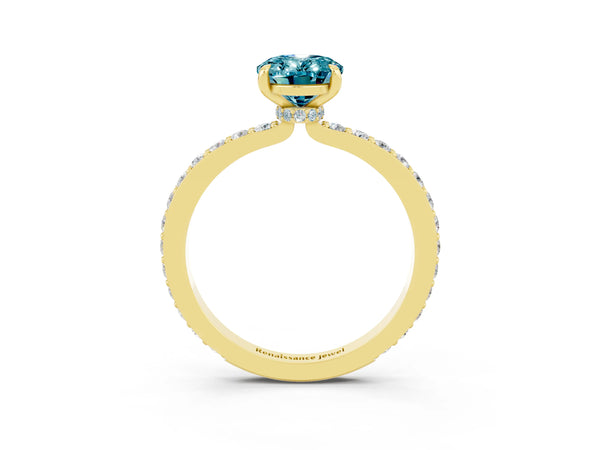 Yellow gold Oval Cut Blue Topaz Solitaire Engagement Ring with Pavé Band and Four-Prong Setting