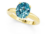 Yellow gold Oval Cut Blue Topaz Solitaire Engagement Ring with Round Band and Four-Prong Setting_1
