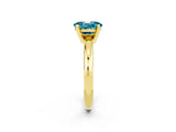 Yellow gold Oval Cut Blue Topaz Solitaire Engagement Ring with Round Band and Four-Prong Setting_2