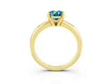 Yellow gold Oval Cut Blue Topaz Solitaire Engagement Ring with Round Band and Four-Prong Setting_3