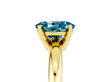 Yellow gold Oval Cut Blue Topaz Solitaire Engagement Ring with Round Band and Four-Prong Setting_5