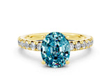 Yellow gold Oval Cut Blue Topaz Solitaire Pavé Engagement Ring with Round Band and Prong Setting_12