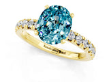 Yellow gold Oval Cut Blue Topaz Solitaire Pavé Engagement Ring with Round Band and Prong Setting_67