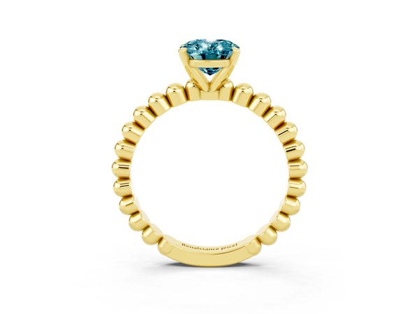 Yellow gold Oval Cut Blue Topaz Solitaire Ring with Beaded Band and Prong Setting