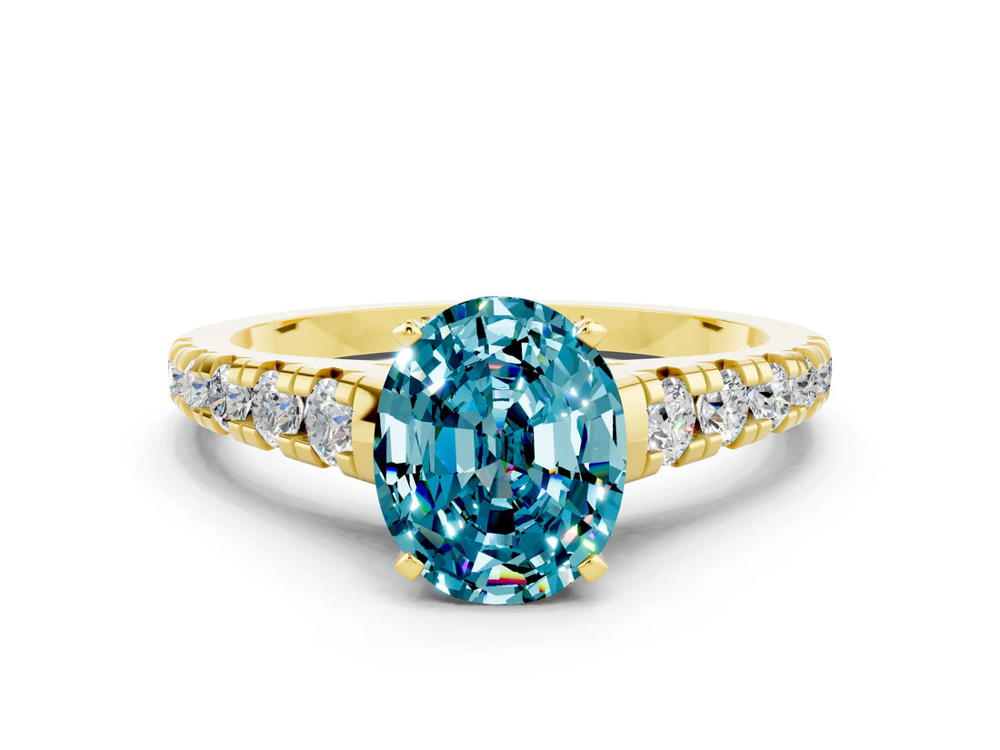 Yellow gold Oval Cut Blue Topaz Solitaire Ring with Cathedral Setting and Pavé Band