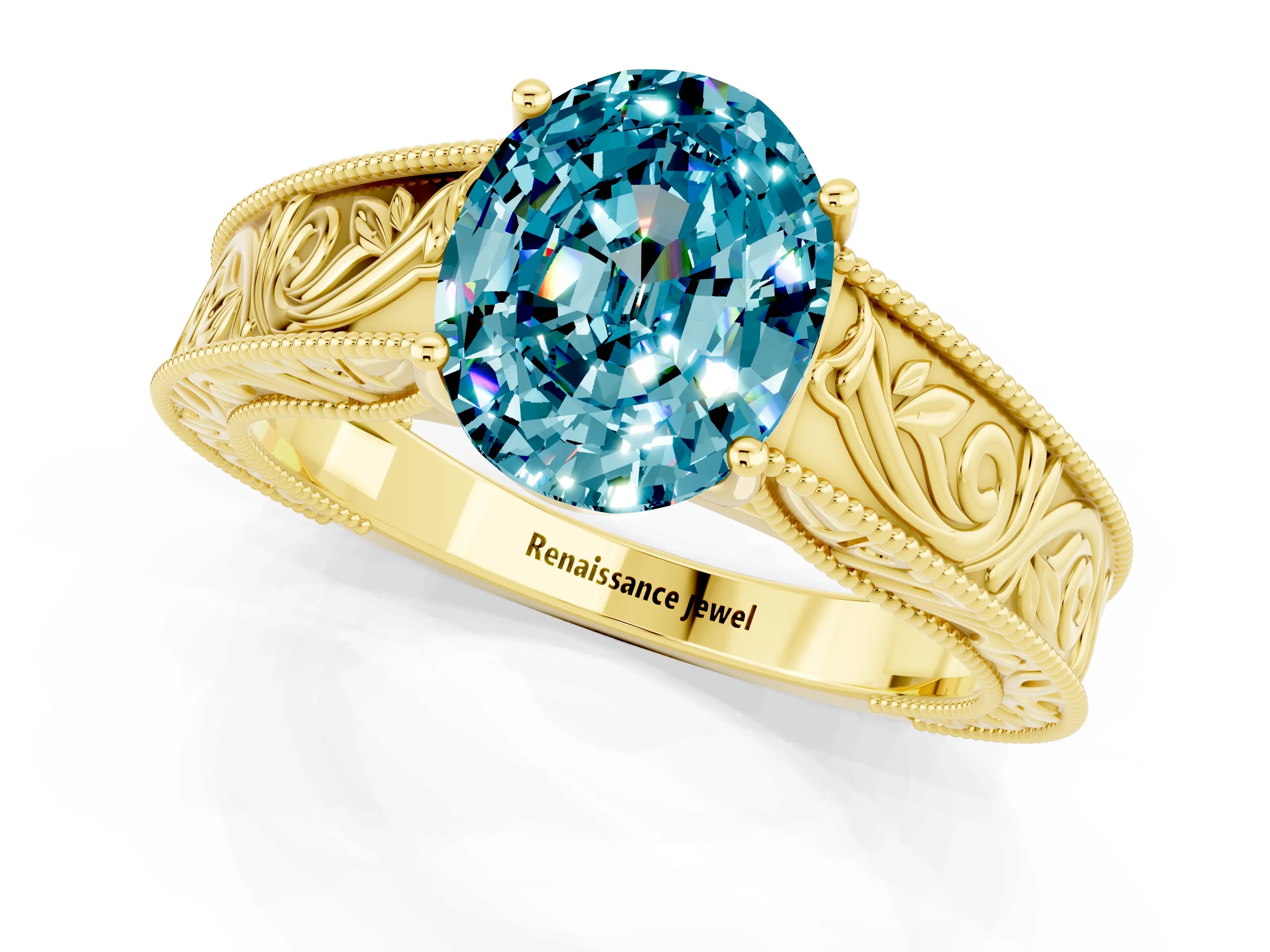 Yellow gold Oval Cut Blue Topaz Solitaire Ring with Engraved Band and Four-Prong Setting_1