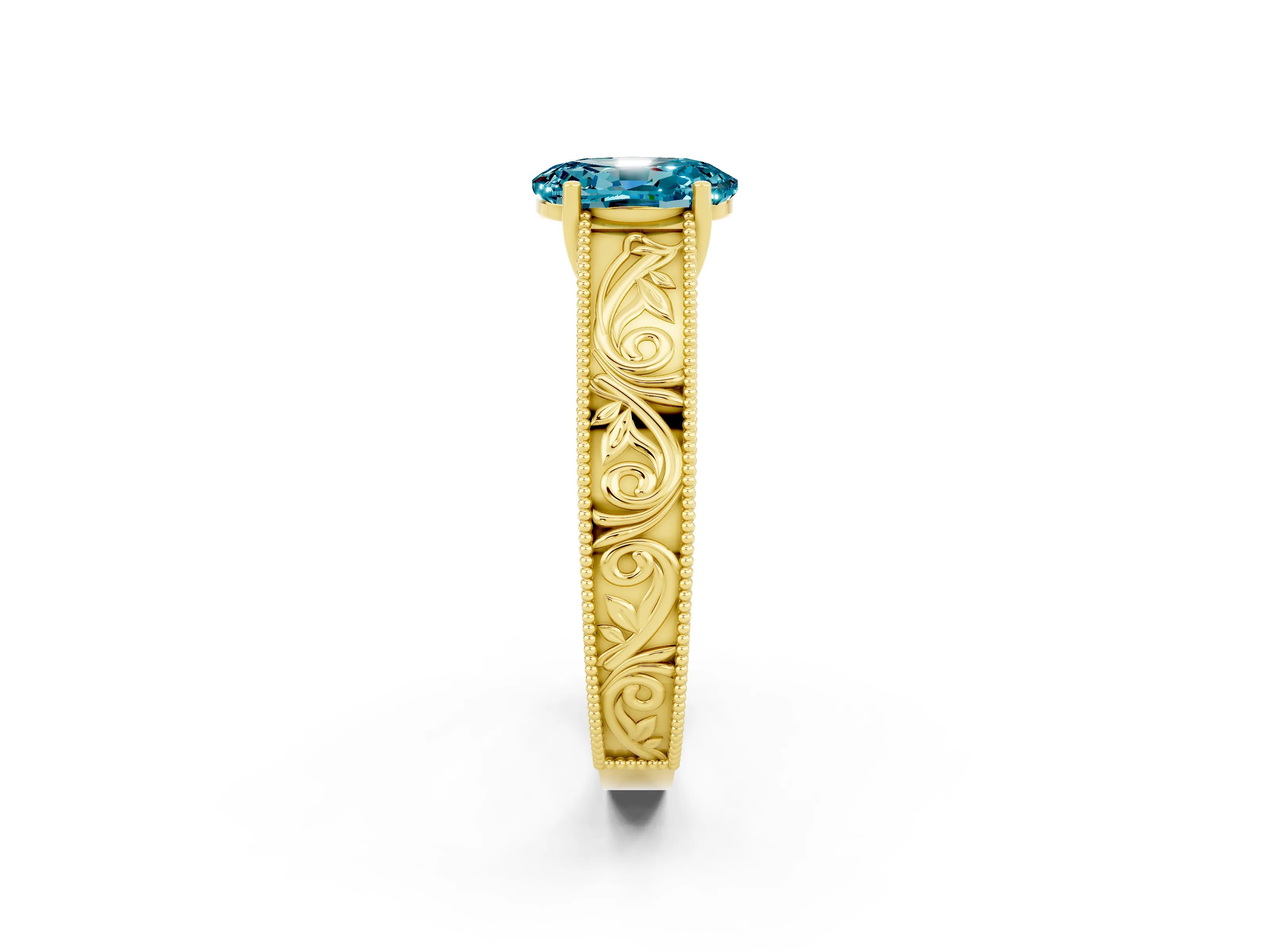 Yellow gold Oval Cut Blue Topaz Solitaire Ring with Engraved Band and Four-Prong Setting_2