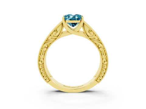 Yellow gold Oval Cut Blue Topaz Solitaire Ring with Engraved Band and Four-Prong Setting_3