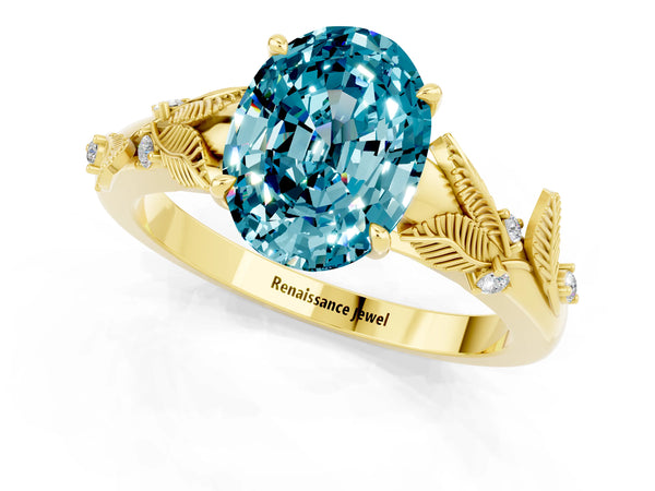 Yellow gold Oval Cut Blue Topaz Solitaire Ring with Leaf Motif Band and Four-Prong Setting