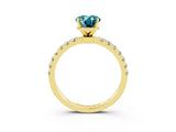 Yellow gold Oval Cut Blue Topaz Solitaire Ring with Pavé Accents and Four-Prong Setting_3