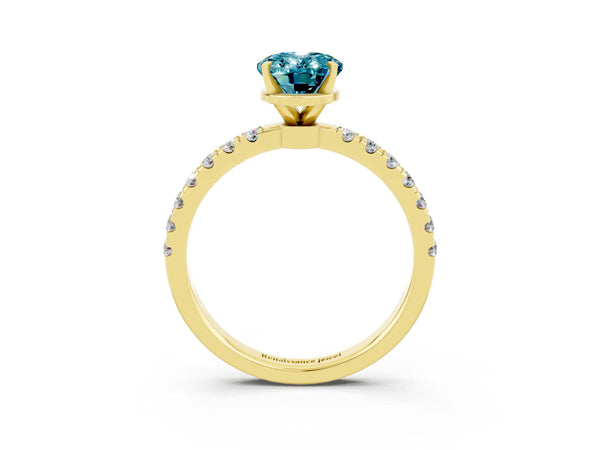 Yellow gold Oval Cut Blue Topaz Solitaire Ring with Pavé Accents and Four-Prong Setting