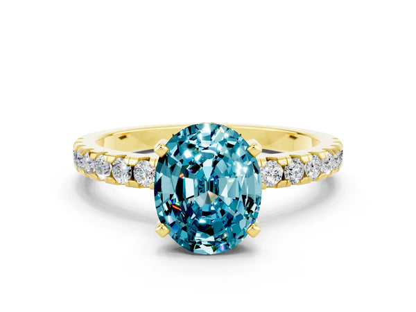 Yellow gold Oval Cut Blue Topaz Solitaire Ring with Round  Pavé Band and Four-Prong Setting