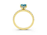 Yellow gold Oval Cut Blue Topaz Solitaire Ring with Pavé Band and Four-Prong Setting_39