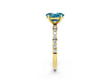 Yellow gold Oval Cut Blue Topaz Solitaire Ring with Pave Band and Four Prong Setting_2