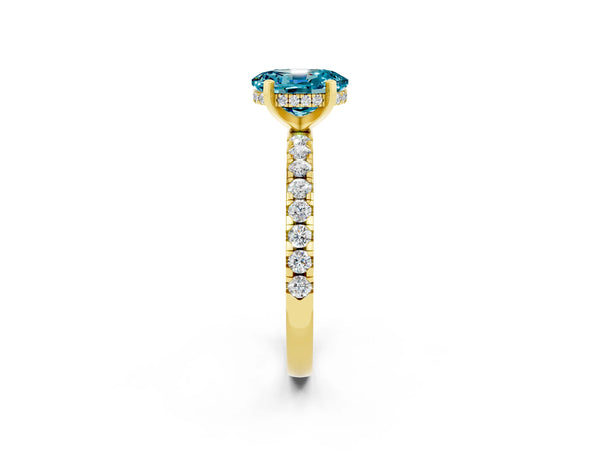 Yellow gold Oval Cut Blue Topaz Solitaire Ring with Round Pavé Band and Four-Prong Setting