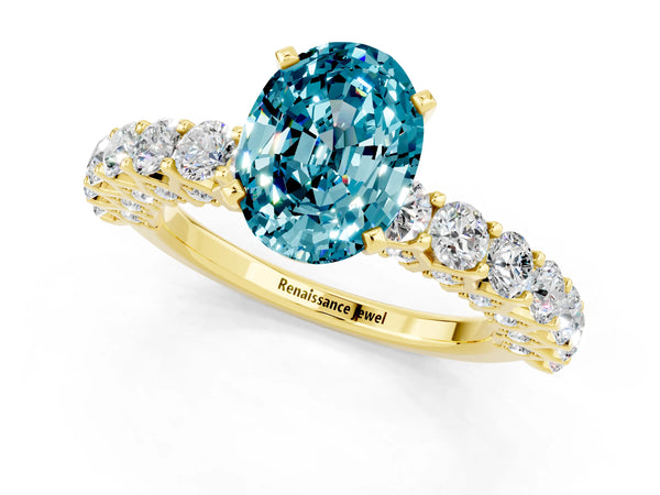 Yellow gold Oval Cut Blue Topaz Solitaire Ring with Shared Prong Pavé Band and Four-Prong Setting