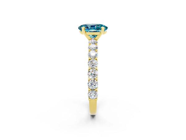 Yellow gold Oval Cut Blue Topaz Solitaire Ring with Shared Prong Pavé Band and Four-Prong Setting
