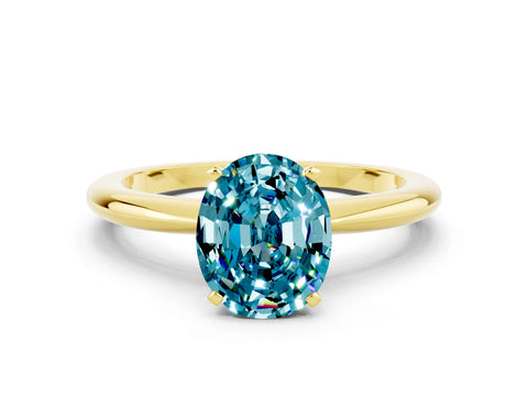 Yellow gold Oval Cut Blue Topaz Solitaire Ring with Six-Prong Setting and Classic Band