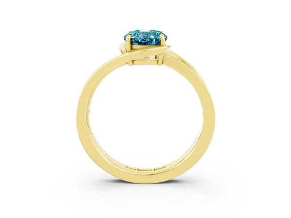 Yellow gold Oval Cut Blue Topaz Solitaire Ring with Split Shank and Prong Setting