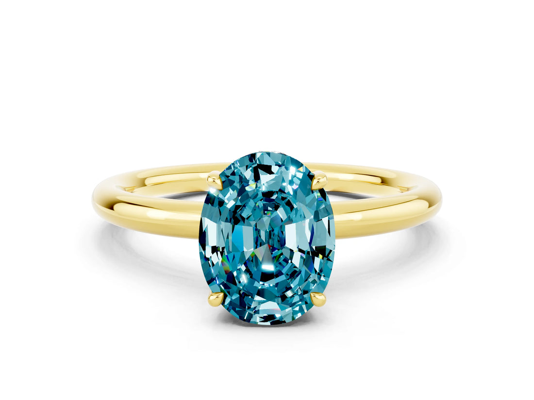 Yellow gold Oval Cut Blue Topaz Solitaire Ring with Thin Band and Four-Prong Setting_12