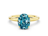 Yellow gold Oval Cut Blue Topaz Solitaire Ring with Thin Band and Four-Prong Setting_12