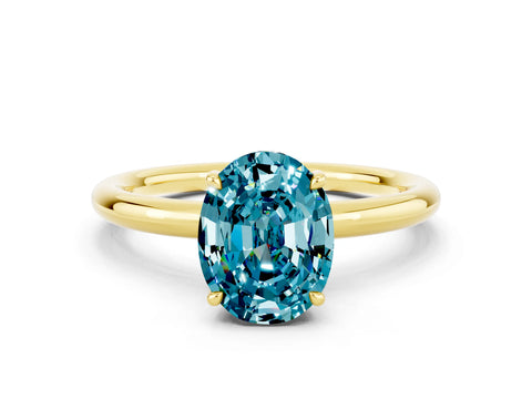 Yellow gold Oval Cut Blue Topaz Solitaire Ring with Thin Band and Four-Prong Setting_12