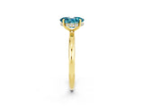 Yellow gold Oval Cut Blue Topaz Solitaire Ring with Thin Band and Four-Prong Setting_14