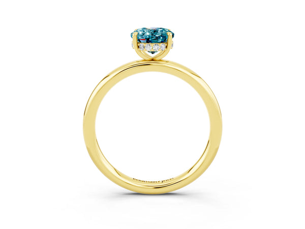 Yellow gold Oval Cut Blue Topaz Solitaire Ring with Thin Band and Four-Prong Setting