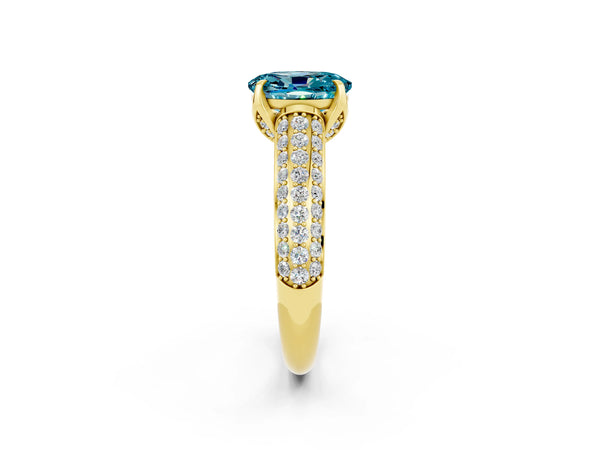 Yellow gold Oval Cut Blue Topaz Solitaire Ring with Three-Row Pavé Band and Four-Prong Setting