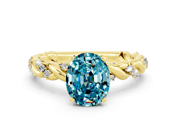 Yellow gold Oval Cut Blue Topaz Solitaire Ring with Twisted Band and Pavé Accents