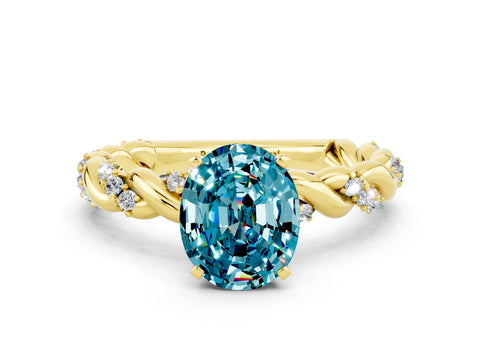 Yellow gold Oval Cut Blue Topaz Solitaire Ring with Twisted Band and Pavé Accents
