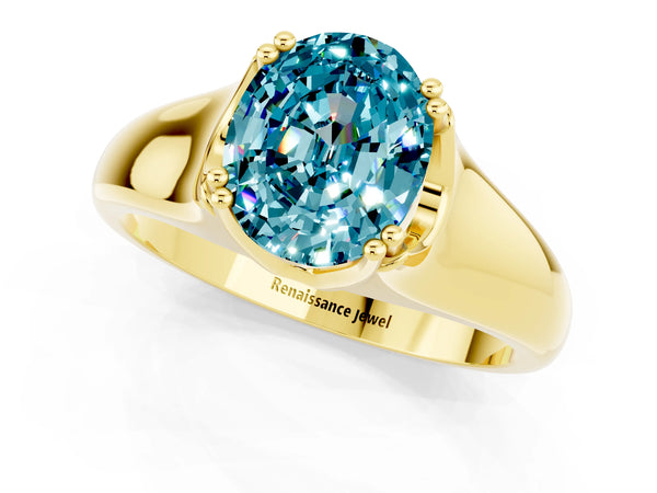 Yellow gold Oval Cut Blue Topaz Solitaire Ring with Wide Band and Prong Setting
