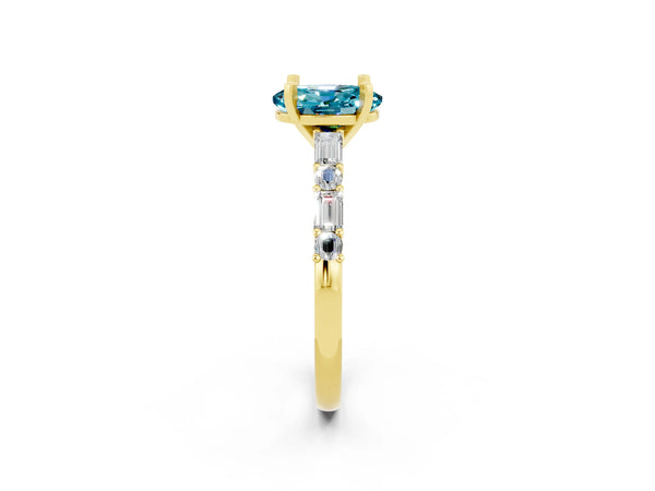 Yellow gold Oval Cut Blue Topaz Solitaire with Side Baguettes and Channel Set Band