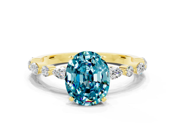 Yellow gold Oval Cut Blue Topaz Ring with Marquise and Round  Side Stones and Four-Prong Setting