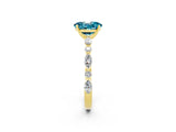 Yellow gold Oval Cut Blue Topaz Solitaire with Side Stones on a Pavé Band and Four-Prong Setting_2
