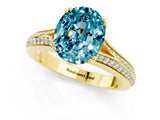 Yellow gold Oval Cut Blue Topaz Split Shank Engagement Ring with Pavé Band_1