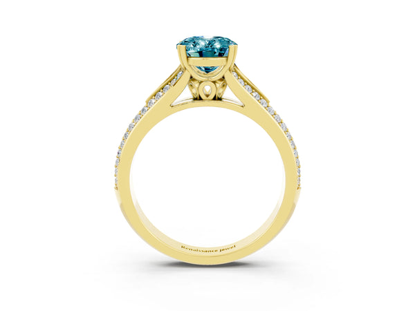 Yellow gold Oval Cut Blue Topaz Split Shank Engagement Ring with Pavé Band