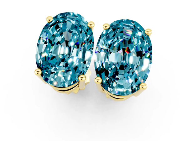 Yellow gold Oval Cut Blue Topaz Stud Earrings