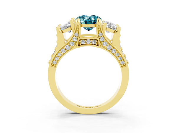 Yellow gold Oval Cut Blue Topaz Three-Stone Ring with Channel Set Band and Four-Prong Setting