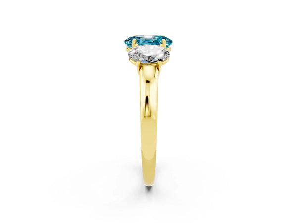 Yellow gold Oval Cut Blue Topaz Three-Stone Ring with Four-Prong Setting and Classic Band