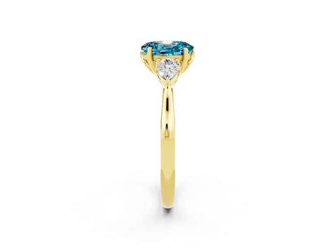 Yellow gold Oval Cut Blue Topaz Three-Stone Ring with Pear Side Stones and Four-Prong Setting_14