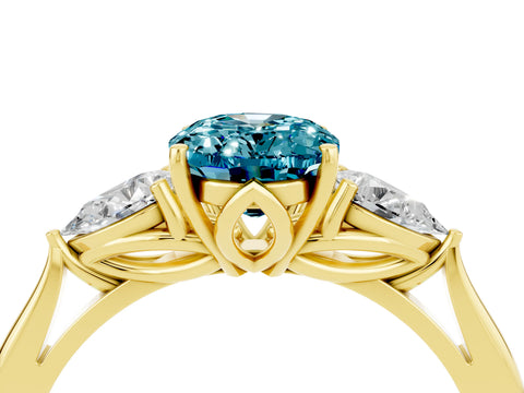 Yellow gold Oval Cut Blue Topaz Three-Stone Ring with Pear Side Stones and Four-Prong Setting_16