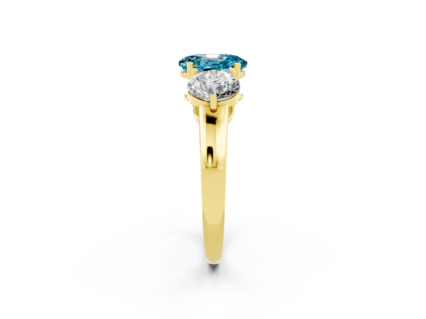 Yellow gold Oval Cut Blue Topaz Three-Stone Ring with Prong Setting and Classic Band
